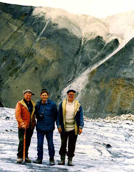 Photo of three geologists in the field