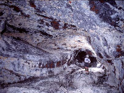 photo of caver inside lave tube