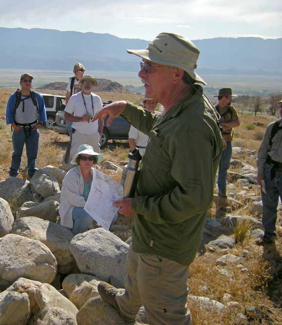 photo of Dave giving a talk in the field