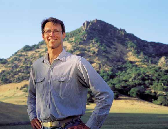 photo of Brian with the butte behind him